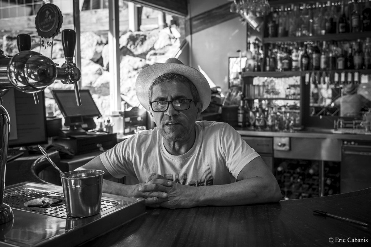Boualem behind the bar of his café-concert-restaurant-grocery in the small village of Montgaillard-Lauragais, near Toulouse, July 7, 2020 Eric Cabanis Photojournalist